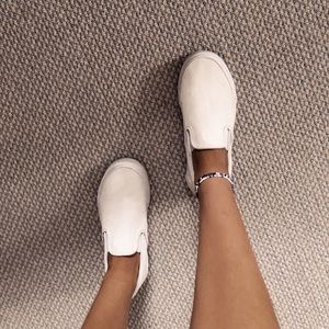 white slip on vans, barely worn.